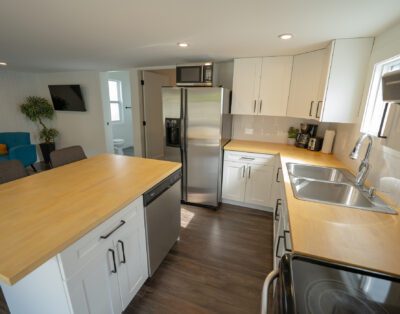 Fully equipped kitchen with full stove and modern appliances at Rockcliffe Getaway vacation rental