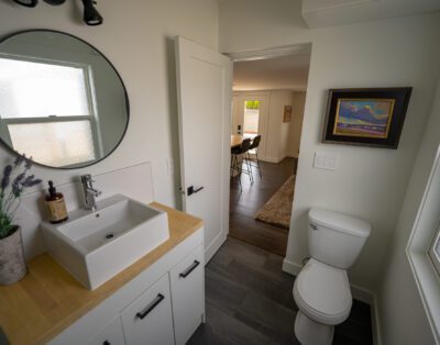 Luxury bathroom with deep soaking tub and walk-in shower at Rockcliffe Getaway Oliver BC rental