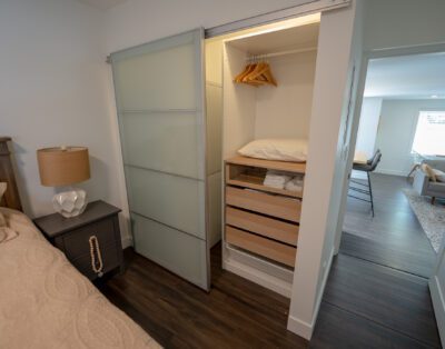 Spacious closet space with luxury linens and ample storage at Rockcliffe Getaway couples retreat